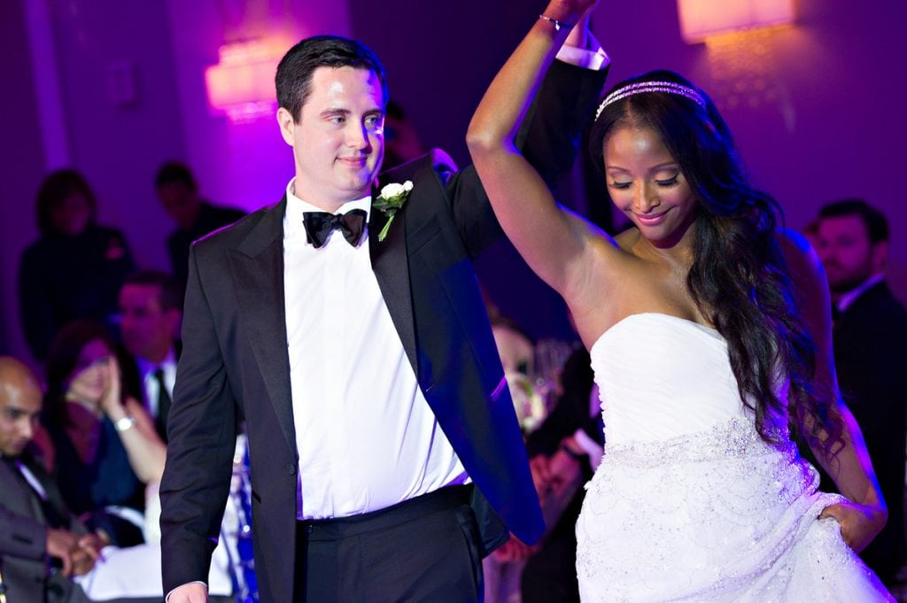 Isha Sesay and Leif Coorlem walking down the Isle in a lavish wedding | Photo credit: HuffPost